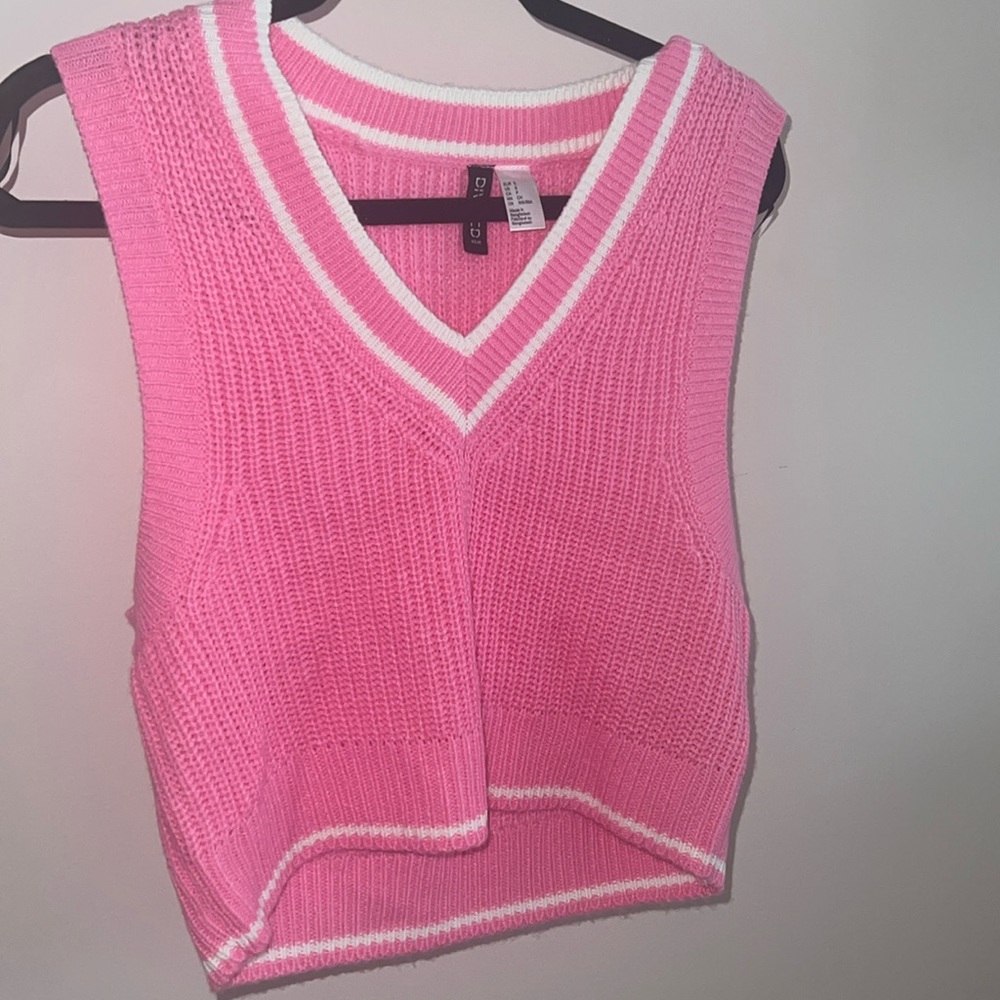 pink sweater vest
